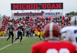 Players in action during a Michigan high school football game