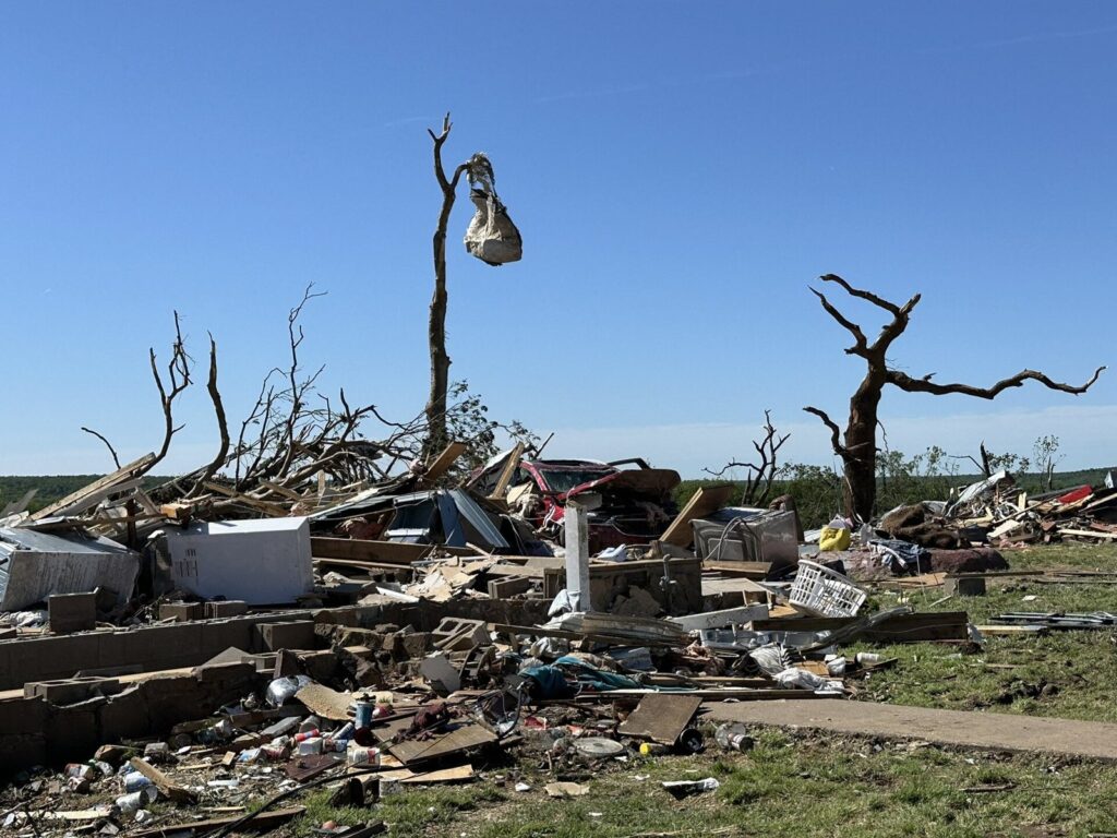 Wreckage and downed trees after a tornado