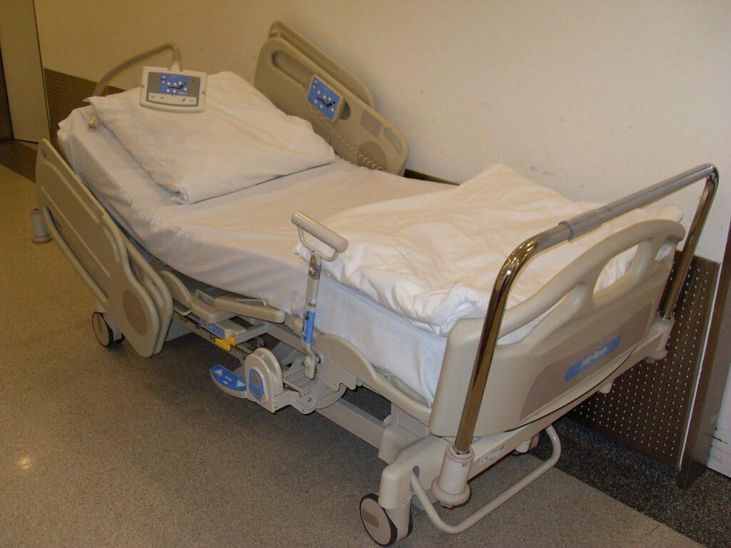 Hospital bed in a patient room